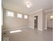 Spacious, light-filled bedroom with neutral colors and ample natural light from three windows at 10483 St Anne Dr, Zionsville, IN 46077