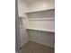 Well-organized closet featuring multiple shelves, offering ample storage space at 10483 St Anne Dr, Zionsville, IN 46077