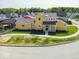 Aerial view of a charming two-story home featuring a landscaped yard and inviting front porch at 10483 St Anne Dr, Zionsville, IN 46077