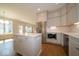 Bright kitchen with an island, stainless appliances, and granite countertops at 10483 St Anne Dr, Zionsville, IN 46077
