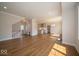 Open-concept living room with hardwood floors and lots of sunlight at 10483 St Anne Dr, Zionsville, IN 46077
