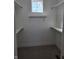 Spacious walk-in closet with shelving and hanging rods for organized storage at 10483 St Anne Dr, Zionsville, IN 46077