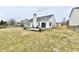Inviting backyard with patio, trampoline, fence, and white siding home at 1055 Berrywood Dr, Greenwood, IN 46143