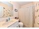 Bathroom featuring a single sink vanity and a shower with decorative curtains at 1055 Berrywood Dr, Greenwood, IN 46143
