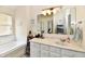 Bathroom with double sink vanity, marble counters, and large tub at 1055 Berrywood Dr, Greenwood, IN 46143