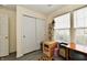 Neutral bedroom featuring a large closet, bright window, and versatile design at 1055 Berrywood Dr, Greenwood, IN 46143