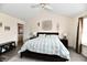Bedroom featuring ensuite bath, neutral colors, and abundant natural light at 1055 Berrywood Dr, Greenwood, IN 46143