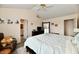Bedroom featuring ensuite bath, neutral colors, and abundant natural light at 1055 Berrywood Dr, Greenwood, IN 46143