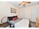 Cozy bedroom with a bed, laminate flooring, and a ceiling fan at 1055 Berrywood Dr, Greenwood, IN 46143