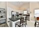 Kitchen with white cabinets, island, and stainless steel appliances at 1055 Berrywood Dr, Greenwood, IN 46143