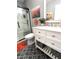 Renovated bathroom with a new vanity, patterned floor, walk-in shower with black trim and gray walls at 1217 Meadowood Dr, Danville, IN 46122