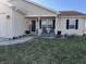Inviting front porch with rocking chairs and charming curb appeal at 1217 Meadowood Dr, Danville, IN 46122