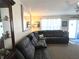 Cozy living room featuring a comfortable sectional sofa and a large window at 1217 Meadowood Dr, Danville, IN 46122