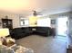 Comfortable living room featuring neutral tones, a ceiling fan, and lots of natural light at 1217 Meadowood Dr, Danville, IN 46122