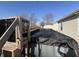 View of the pool deck and a partially covered above-ground pool in backyard at 1217 Meadowood Dr, Danville, IN 46122