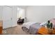Bedroom featuring a twin bed, wood accents, and neutral color palette at 1224 N Olney St, Indianapolis, IN 46201