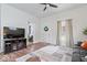 Open living space showcasing hardwood floors and abundant natural light from large windows at 1224 N Olney St, Indianapolis, IN 46201