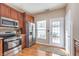 Modern kitchen with stainless steel appliances and access to the backyard at 1225 Middlebury Dr, Westfield, IN 46074