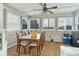 Bright enclosed dining area with plenty of natural light and a ceiling fan at 1288 Ivory Ct, Greenwood, IN 46143