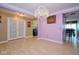 Formal living room featuring a chandelier and open doors leading to other rooms in the home at 1288 Ivory Ct, Greenwood, IN 46143