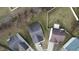 An aerial view of a neighborhood showcases homes with driveways and spacious yards in a residential community at 13446 N Carwood Ct, Camby, IN 46113