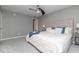 Cozy bedroom featuring a ceiling fan, and stylish decor with a comfy bed and soft pillows at 13446 N Carwood Ct, Camby, IN 46113