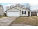Charming single-story home with vinyl siding, a well-manicured lawn, and an attached one car garage at 13446 N Carwood Ct, Camby, IN 46113