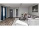 Comfortable living room featuring hardwood floors, neutral paint, a plush couch, and stylish decor at 13446 N Carwood Ct, Camby, IN 46113