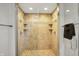 Modern shower featuring dual shower heads and built-in shelving at 1422 Carrollton Ave, Indianapolis, IN 46202
