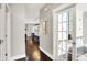 Hallway leading to an open-concept kitchen and living area, offering a seamless flow between spaces at 1422 Carrollton Ave, Indianapolis, IN 46202