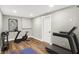 Basement gym with new equipment, recessed lighting, and ample space for workouts at 1422 Carrollton Ave, Indianapolis, IN 46202