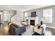 Stylish living room with a cozy fireplace and plenty of natural light at 1422 Carrollton Ave, Indianapolis, IN 46202