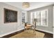 Bright office featuring natural light, clean lines, neutral colors and hardwood floors for a modern feel at 1422 Carrollton Ave, Indianapolis, IN 46202