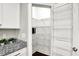 Spacious pantry with wire shelving, offering plenty of storage space for all your kitchen needs at 1422 Carrollton Ave, Indianapolis, IN 46202