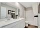 Bright bathroom featuring double sinks, quartz counters, and a shower/tub combo at 1439 Bellows Ave, Franklin, IN 46131