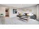 Cozy living room featuring a plush gray sectional sofa, stylish decor, a modern coffee table, and a comfortable bench at 1439 Bellows Ave, Franklin, IN 46131
