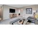 Comfortable living room with a large TV, stylish console, a gray sofa, and modern decor for a relaxing atmosphere at 1439 Bellows Ave, Franklin, IN 46131
