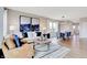 Cozy living room with modern decor, plush seating, and seamless flow into the dining area at 1439 Bellows Ave, Franklin, IN 46131