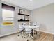 Bright home office with ample natural light, a sleek desk setup, and minimalist decor at 1439 Bellows Ave, Franklin, IN 46131