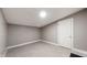 Bright unfinished basement with a walk-out door and ample potential for customization at 1611 Elmhurst Dr, Indianapolis, IN 46219