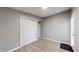 Spacious bedroom with hardwood floors, ample closet space, and plenty of natural light at 1611 Elmhurst Dr, Indianapolis, IN 46219