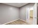 Bright bedroom offering hardwood floors and ensuite bathroom, perfect for relaxation at 1611 Elmhurst Dr, Indianapolis, IN 46219