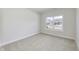 Bedroom featuring carpet and a large window that brings in natural light at 16799 Imperial Ct, Fishers, IN 46040