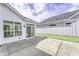 Exterior patio showcasing sliding glass door and bright white siding at 16799 Imperial Ct, Fishers, IN 46040