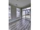 Cozy sunroom with a glass sliding door to backyard patio at 16799 Imperial Ct, Fishers, IN 46040