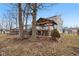 Backyard featuring a hot tub gazebo and a deck, great for outdoor entertaining and relaxation at 1750 Quiet Haven Cir, Indianapolis, IN 46229
