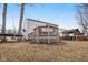 Backyard featuring a trampoline, a deck with pergola, and a hot tub gazebo, great for recreation at 1750 Quiet Haven Cir, Indianapolis, IN 46229