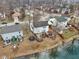 An aerial view of backyards that overlook a scenic pond at 1750 Quiet Haven Cir, Indianapolis, IN 46229