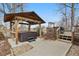 Backyard featuring a hot tub under a gazebo and a deck, great for outdoor living and entertaining at 1750 Quiet Haven Cir, Indianapolis, IN 46229