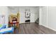 Finished basement area with toys and access to basement bedroom at 1750 Quiet Haven Cir, Indianapolis, IN 46229